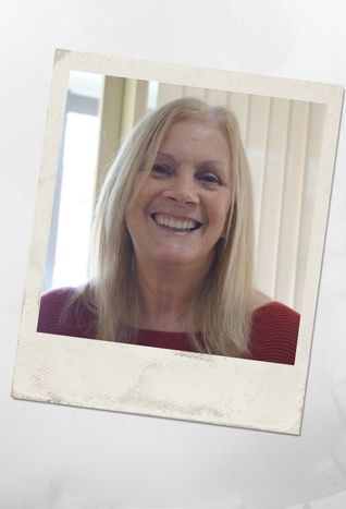 Smiling female resident indoors at Kirkley Gardens, natural light and neutral interior reflecting independent living in a retirement village